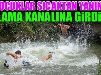 Sıcaktan bunalan çocuklar sulama kanalında serinledi