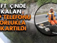 Zift İçinde Kalan Cep Telefonu Zorlukla Çıkartıldı