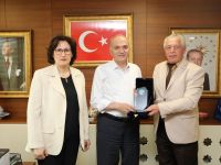 KAFFED’den Başkan Özlü’ye plaket